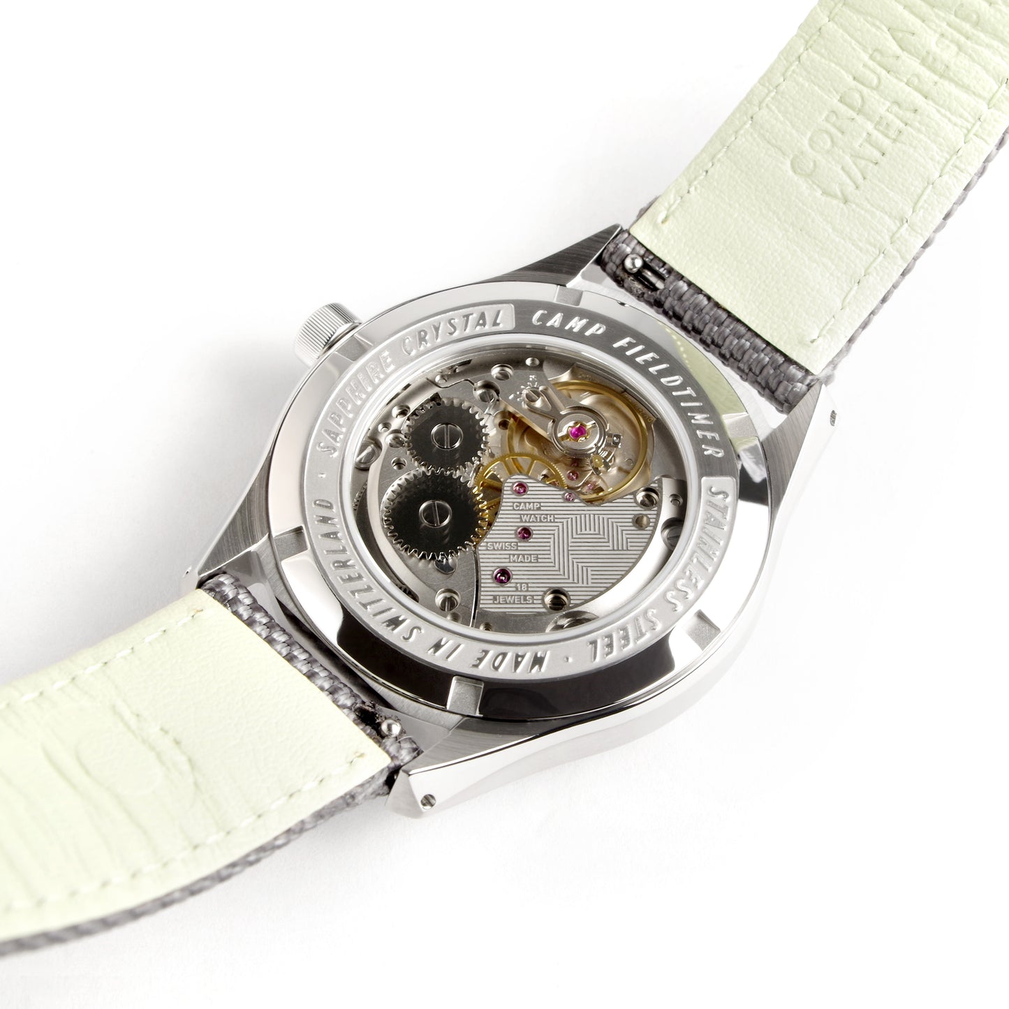 Back view of Swiss Made mechanical watch with 39mm light green enamel lacquer dial for men and women designed by Camp Watches in Los Angeles.