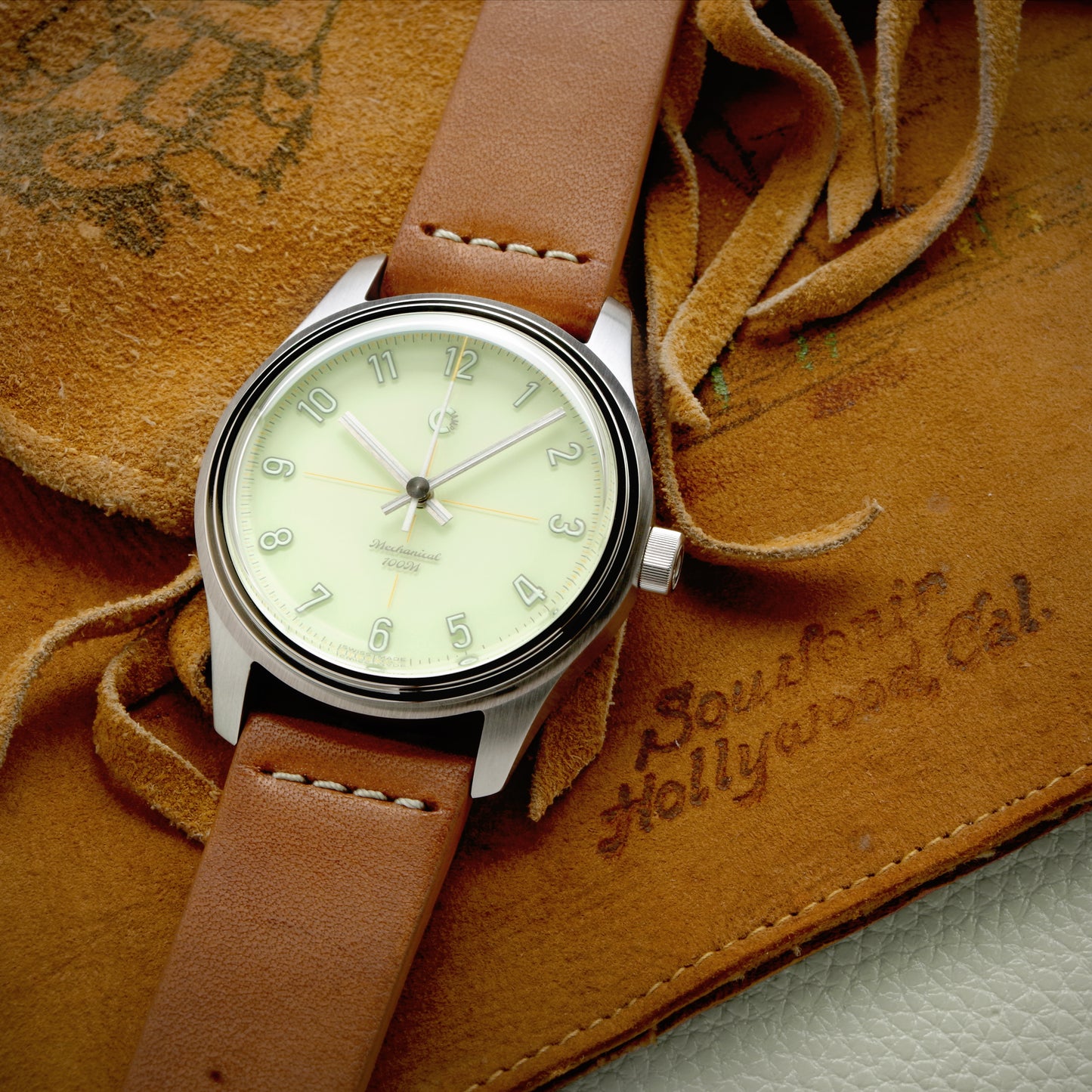 Swiss Made mechanical watch with 39mm light green enamel lacquer dial for men and women designed by Camp Watches in Los Angeles.