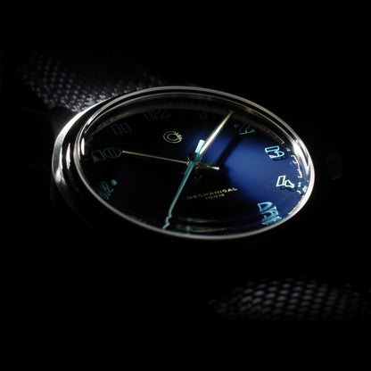 Close up of Swiss Made mechanical watch with 39mm blue enamel lacquer dial for men and women designed by Camp Watches in Los Angeles.